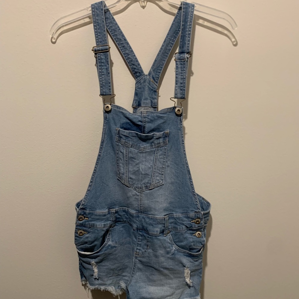 Medium-wash, lightly distressed overalls
